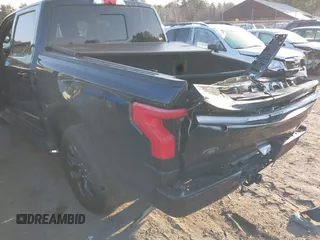 2023 Ford F-150 Lightning Pro with VIN 1FT6W1EV7PWG33511, listed as a IAAI auction lot 41761149 with 10,501 mi miles and . Bid and sale history available at DreamBid. Image 6.