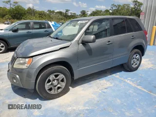 2009 Suzuki Grand Vitara z VIN JS3TD042694100821, wystawiony jako Copart lot #57209065 z przebiegiem 89 362 mil mil oraz Szkoda całkowita • Salvage title. Historia ofert i sprzedaży dostępna na DreamBid. Obrazek 1.