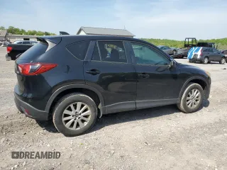 2015 Mazda CX-5 Touring with VIN JM3KE4CY6F0434538, listed as a Copart auction lot 54966145 with 209,447 mi miles and Clean Title. Bid and sale history available at DreamBid. Image 3.