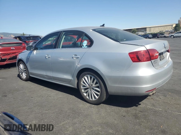2012 Volkswagen Jetta SEL with VIN 3VWLP7AJ6CM324271, listed as a Copart auction lot 59986855 with 129,002 mi miles and Salvage title. Bid and sale history available at DreamBid. Image 2.