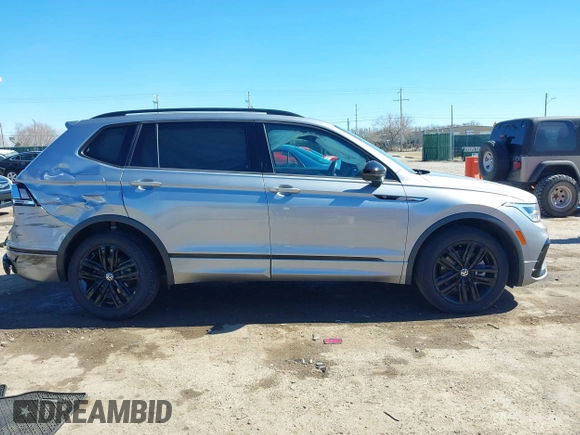 2022 Volkswagen Tiguan SE R-Line Black z VIN 3VVCB7AX4NM008121, wystawiony jako IAAI lot #41671382 z przebiegiem 71 674 mil mil oraz . Historia ofert i sprzedaży dostępna na DreamBid. Obrazek 13.