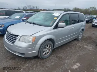 2008 Chrysler Town & Country Touring with VIN 2A8HR54P18R611579, listed as a IAAI auction lot 41909066 with 106,143 mi miles. Bid and sale history available at carsss.com. Image 2.