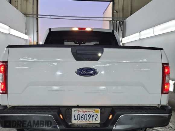 2020 Ford F-150 XL with VIN 1FTEW1E54LKD83593, listed as a IAAI auction lot 42387290 with 85,264 mi miles and . Bid and sale history available at DreamBid. Image 1.