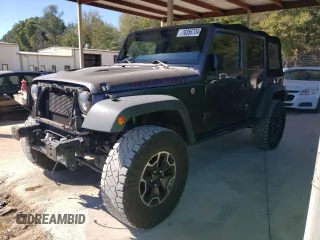 2016 Jeep Wrangler Unlimited Rubicon Hard Rock with VIN 1C4HJWFG7GL239318, listed as a Copart auction lot 76356734 with 121,442 mi miles and Salvage Title. Bid and sale history available at carsss.com. Image 1.