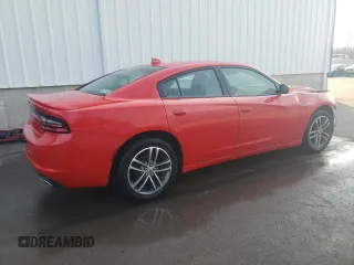 2019 Dodge Charger SXT with VIN 2C3CDXJGXKH611601, listed as a Copart auction lot 71523354 with 133,178 mi miles and Clean Title. Bid and sale history available at DreamBid. Image 3.