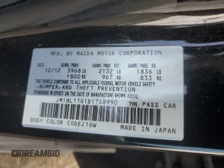 2013 Mazda 3 i SV with VIN JM1BL1TG1D1768990, listed as a Copart auction lot 51391385 with 77,069 mi miles and Salvage Title. Bid and sale history available at DreamBid. Image 12.
