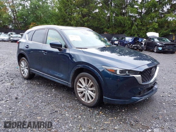 2023 Mazda CX-5 Signature with VIN JM3KFBXY4P0153335, listed as a IAAI auction lot 40053867 with 17,828 mi miles and . Bid and sale history available at carsss.com. Image 1.