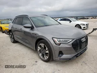 2021 Audi e-tron Premium z VIN WA1AAAGE4MB031782, wystawiony jako Copart lot #65578012 z przebiegiem 21 981 mil mil oraz . Historia ofert i sprzedaży dostępna na DreamBid. Obrazek 1.