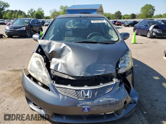 2011 Honda Fit Sport z VIN JHMGE8H5XBC002174, wystawiony jako Copart lot #52220125 z przebiegiem 161 816 mil mil oraz Szkody całkowita. Historia ofert i sprzedaży dostępna na DreamBid. Obrazek 5.