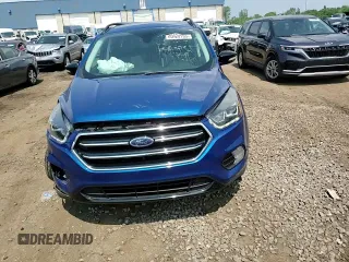 2019 Ford Escape Titanium z VIN 1FMCU9J99KUB39487, wystawiony jako Copart lot #60424765 z przebiegiem 43 094 mil mil oraz Szkoda całkowita • Salvage title. Historia ofert i sprzedaży dostępna na DreamBid. Obrazek 13.
