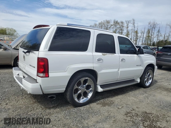 2002 Cadillac Escalade z VIN 1GYEK63N42R110276, wystawiony jako Copart lot #52862665 z przebiegiem Nie podano mil oraz Szkoda całkowita • Salvage title. Historia ofert i sprzedaży dostępna na DreamBid. Obrazek 3.