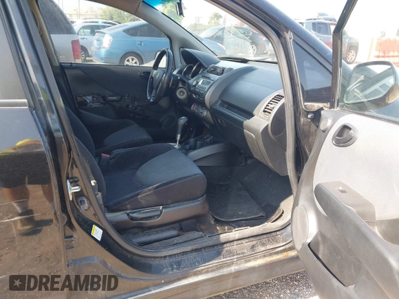 2007 Honda Fit Sport with VIN JHMGD38687S033127, listed as a IAAI auction lot 42722884 with 174,818 mi miles and . Bid and sale history available at DreamBid. Image 5.