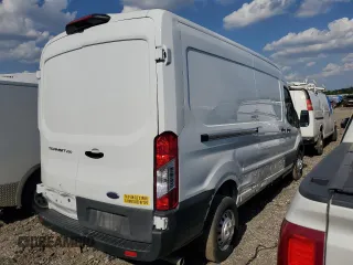 2023 Ford Transit Cargo с VIN 1FTBR1C8XPKB44983, выставлен на аукционе Copart как лот 63350635 с пробегом 73 083 миль миль и Списание • Salvage title. История ставок и продаж доступна на DreamBid. Изображение 3.