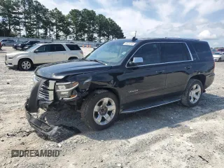 2015 Chevrolet Tahoe LTZ with VIN 1GNSCCKC2FR693500, listed as a Copart auction lot 60225195 with 206,210 mi miles and Salvage title. Bid and sale history available at DreamBid. Image 1.