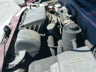 2000 Chevrolet Astro z VIN 1GNDM19WXYB210115, wystawiony jako IAAI lot #42629360 z przebiegiem 257 120 mil mil oraz . Historia ofert i sprzedaży dostępna na DreamBid. Obrazek 13.