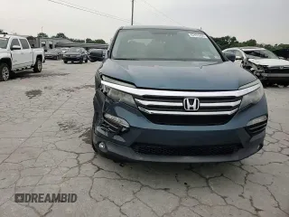 2016 Honda Pilot EX-L z VIN 5FNYF5H57GB039453, wystawiony jako Copart lot #57473405 z przebiegiem 54 551 mil mil oraz Szkoda całkowita • Salvage title. Historia ofert i sprzedaży dostępna na DreamBid. Obrazek 14.