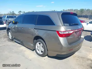 2013 Honda Odyssey Touring with VIN 5FNRL5H96DB066008, listed as a IAAI auction lot 41734055 with 120,292 mi miles. Bid and sale history available at carsss.com. Image 3.