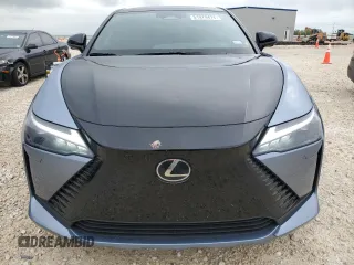 2023 Lexus RZ with VIN JTJAAAAB2PA004270, listed as a Copart auction lot 51979474 with 14,860 mi miles and Clean Title. Bid and sale history available at carsss.com. Image 5.
