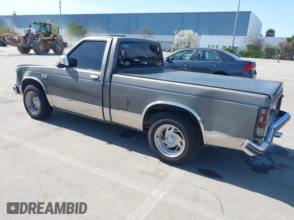 1987 GMC Sonoma with VIN 1GTBS14E2H8501760, listed as a IAAI auction lot 41852033 with 175,529 mi miles and . Bid and sale history available at DreamBid. Image 3.