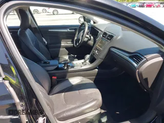 2016 Ford Fusion Titanium with VIN 3FA6P0K9XGR158234, listed as a IAAI auction lot 42043716 with 161,164 mi miles. Bid and sale history available at carsss.com. Image 5.