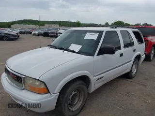 2001 GMC Jimmy SLE z VIN 1GKCS13W312208879, wystawiony jako IAAI lot #42284916 z przebiegiem 204 219 mil mil oraz . Historia ofert i sprzedaży dostępna na DreamBid. Obrazek 2.