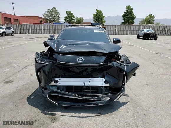 2024 Toyota bZ4X XLE with VIN JTMAAAAAXRA037109, listed as a Copart auction lot 64773014 with 1,232 mi miles and Salvage Title. Bid and sale history available at carsss.com. Image 12.