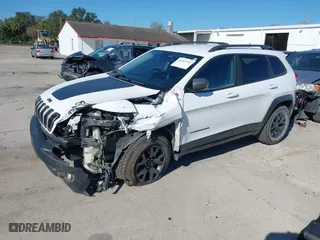 2018 Jeep Cherokee Trailhawk with VIN 1C4PJMBX8JD562994, listed as a IAAI auction lot 41281555 with 86,702 mi miles. Bid and sale history available at carsss.com. Image 18.