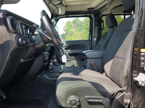 2020 Jeep Wrangler Unlimited Sport Altitude with VIN 1C4HJXDG2LW323502, listed as a Copart auction lot 59716595 with 47,296 mi miles and Salvage title. Bid and sale history available at DreamBid. Image 7.