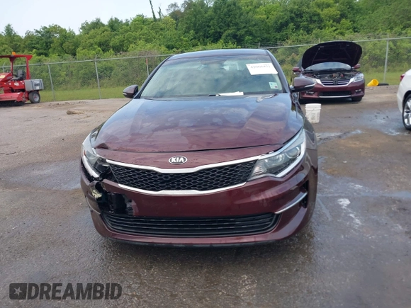 2016 Kia Optima LX with VIN 5XXGT4L32GG105361, listed as a IAAI auction lot 42066431 with 61,026 mi miles. Bid and sale history available at carsss.com. Image 12.
