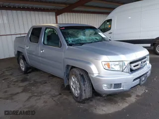 2010 Honda Ridgeline RTS with VIN 5FPYK1F44AB012014, listed as a IAAI auction lot 41512001 with 167,208 mi miles. Bid and sale history available at carsss.com. Image 1.