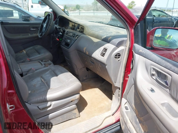 2003 Honda Odyssey EX-L with VIN 5FNRL189X3B135872, listed as a IAAI auction lot 42035948 with Not Provided miles and . Bid and sale history available at DreamBid. Image 5.