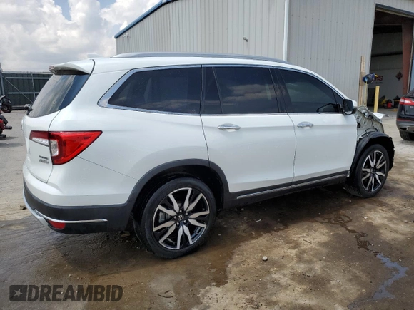 2021 Honda Pilot Touring 7-Passenger z VIN 5FNYF6H68MB077008, wystawiony jako Copart lot #54133735 z przebiegiem 96 052 mil mil oraz Szkoda całkowita • Salvage title. Historia ofert i sprzedaży dostępna na DreamBid. Obrazek 3.