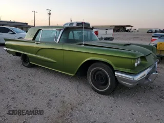 1960 Ford Thunderbird with VIN 0Y71Y166846, listed as a Copart auction lot 80034714 with 74,470 mi miles and Salvage Title. Bid and sale history available at DreamBid. Image 4.