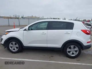 2013 Kia Sportage LX with VIN KNDPBCA21D7356092, listed as a IAAI auction lot 42111086 with 102,521 mi miles and . Bid and sale history available at carsss.com. Image 14.
