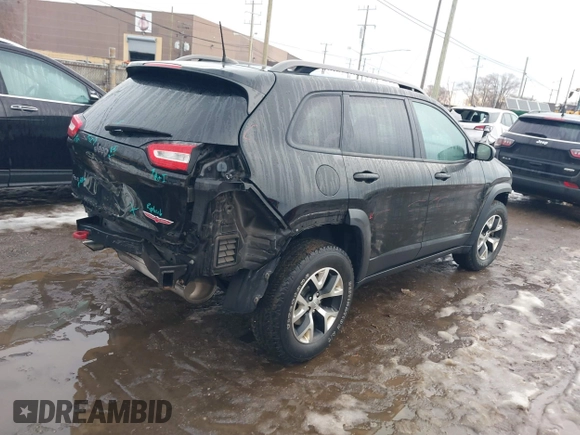 2017 Jeep Cherokee Trailhawk L Plus with VIN 1C4PJMBB9HW551506, listed as a IAAI auction lot 41650841 with 51,273 mi miles. Bid and sale history available at carsss.com. Image 4.