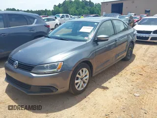 2011 Volkswagen Jetta SE with VIN 3VWDX7AJ4BM330203, listed as a IAAI auction lot 42256889 with 209,557 mi miles and . Bid and sale history available at DreamBid. Image 2.