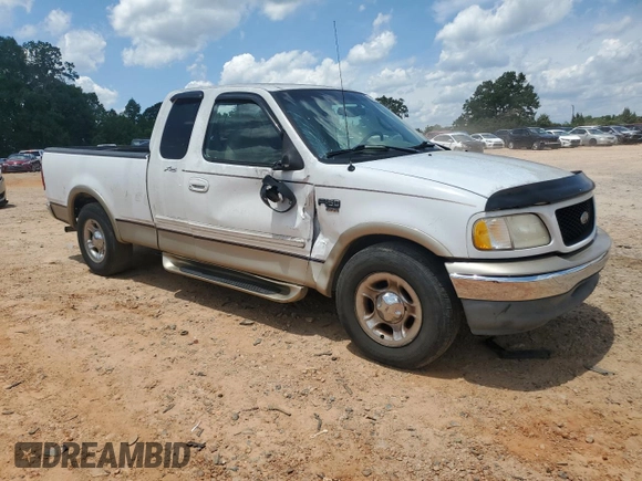 2000 Ford F-150 XL with VIN 1FTRX17L4YNB99870, listed as a Copart auction lot 60287985 with Not provided miles and Salvage title. Bid and sale history available at DreamBid. Image 4.
