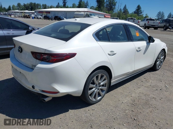 2021 Mazda 3 with VIN JM1BPBDL6M1340029, listed as a IAAI auction lot 42461850 with 79,798 mi miles and . Bid and sale history available at DreamBid. Image 4.