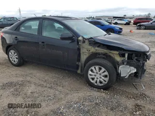 2012 Kia Forte EX with VIN KNAFU4A29C5597563, listed as a Copart auction lot 69807704 with 98,267 mi miles and Salvage Title. Bid and sale history available at carsss.com. Image 4.