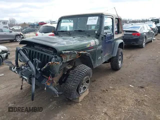 1997 Jeep Wrangler SE with VIN 1J4FY29PXVP406939, listed as a IAAI auction lot 41612380 with 248,314 mi miles. Bid and sale history available at carsss.com. Image 2.
