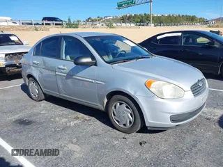 2006 Hyundai Accent GLS with VIN KMHCN46C16U023680, listed as a IAAI auction lot 41253207 with 157,398 mi miles. Bid and sale history available at carsss.com. Image 1.