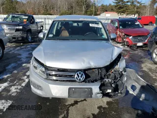 2014 Volkswagen Tiguan SE z VIN WVGAV3AX9EW563907, wystawiony jako Copart lot #45157495 z przebiegiem 100 174 mil mil oraz Szkoda całkowita • Salvage title. Historia ofert i sprzedaży dostępna na DreamBid. Obrazek 5.