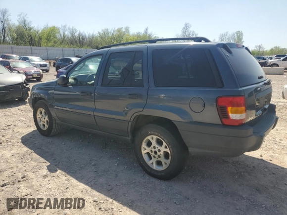 2003 Jeep Grand Cherokee Laredo with VIN 1J4GX48S83C504543, listed as a Copart auction lot 52723835 with 220,574 mi miles and Clean Title. Bid and sale history available at carsss.com. Image 2.