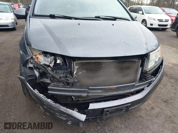 2014 Honda Odyssey EX-L with VIN 5FNRL5H63EB033684, listed as a IAAI auction lot 42025249 with 128,017 mi miles and . Bid and sale history available at carsss.com. Image 6.
