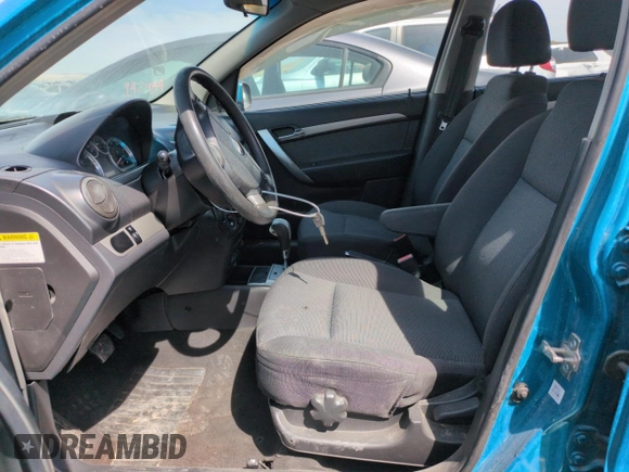 2009 Chevrolet Aveo 1LT z VIN KL1TD56E89B632383, wystawiony jako Copart lot #50611115 z przebiegiem 117 109 mil mil oraz Szkoda całkowita • Salvage title. Historia ofert i sprzedaży dostępna na DreamBid. Obrazek 7.
