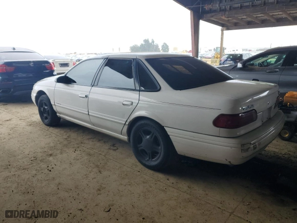 1994 Ford Taurus GL with VIN 1FALP52U5RA259098, listed as a Copart auction lot 85495274 with 83,616 mi miles and Salvage Title. Bid and sale history available at carsss.com. Image 2.