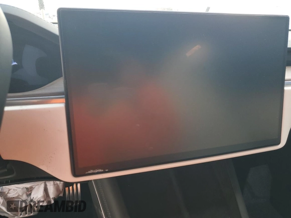2022 Tesla Model S z VIN 5YJSA1E57NF474679, wystawiony jako Copart lot #56608285 z przebiegiem Nie podano mil oraz Szkoda całkowita • Salvage title. Historia ofert i sprzedaży dostępna na DreamBid. Obrazek 9.