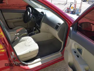 2008 Kia Spectra EX with VIN KNAFE121385509258, listed as a IAAI auction lot 41775275 with 174,102 mi miles. Bid and sale history available at carsss.com. Image 5.