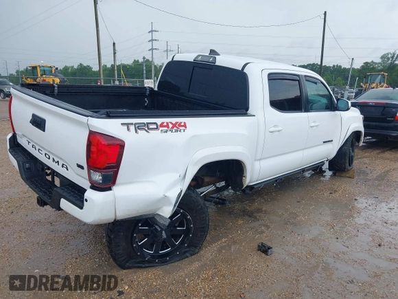 2019 Toyota Tacoma SR z VIN 3TMCZ5AN0KM232852, wystawiony jako IAAI lot #42178269 z przebiegiem 71 545 mil mil oraz . Historia ofert i sprzedaży dostępna na DreamBid. Obrazek 4.