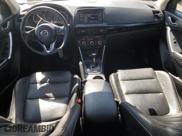 2014 Mazda CX-5 Grand Touring with VIN JM3KE4DY4E0305212, listed as a Copart auction lot 53145305 with 233,061 mi miles and Salvage Title. Bid and sale history available at carsss.com. Image 8.